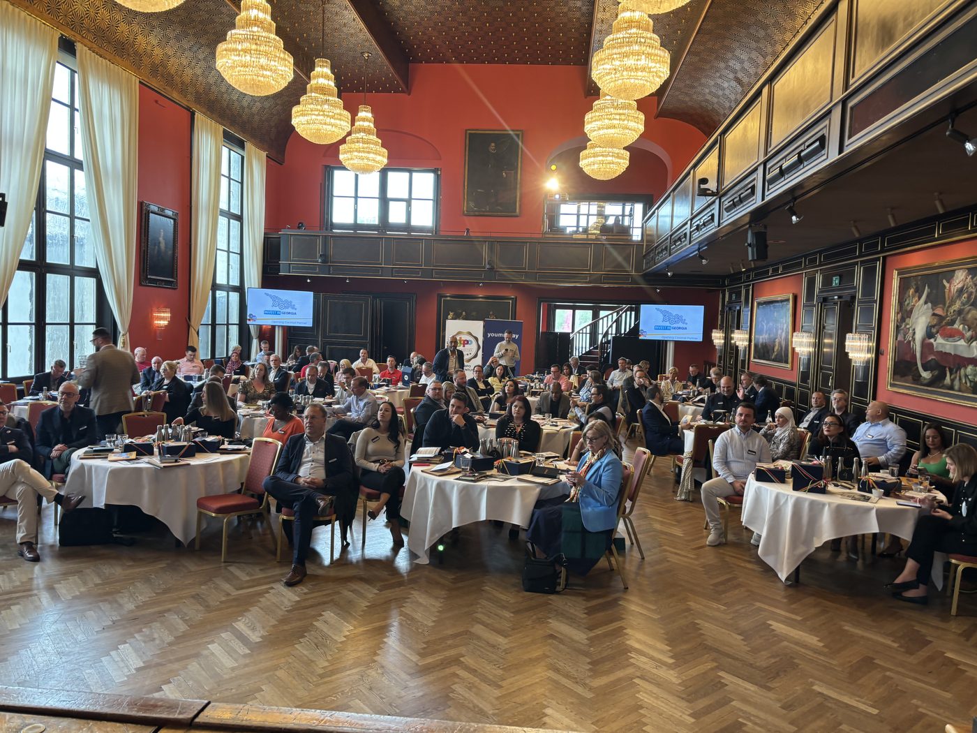 Full audience view from the stage during the CX Disruptors Panel, CxOutsourcers 2025, Munich